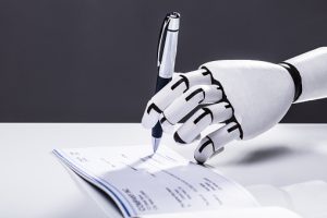 Photo Of Robot Hand Signing Cheque With Pen